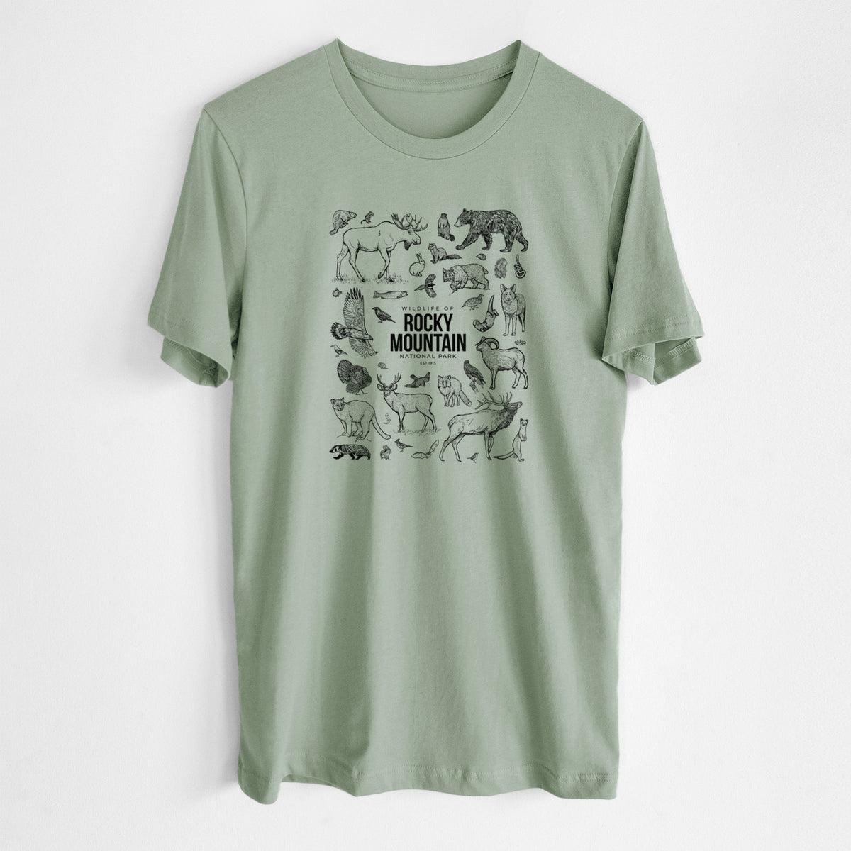 Sage green lightweight cotton t-shirt laid flat, printed with a collection of black ink wildlife illustrations surrounding the words Rocky Mountain National Park.