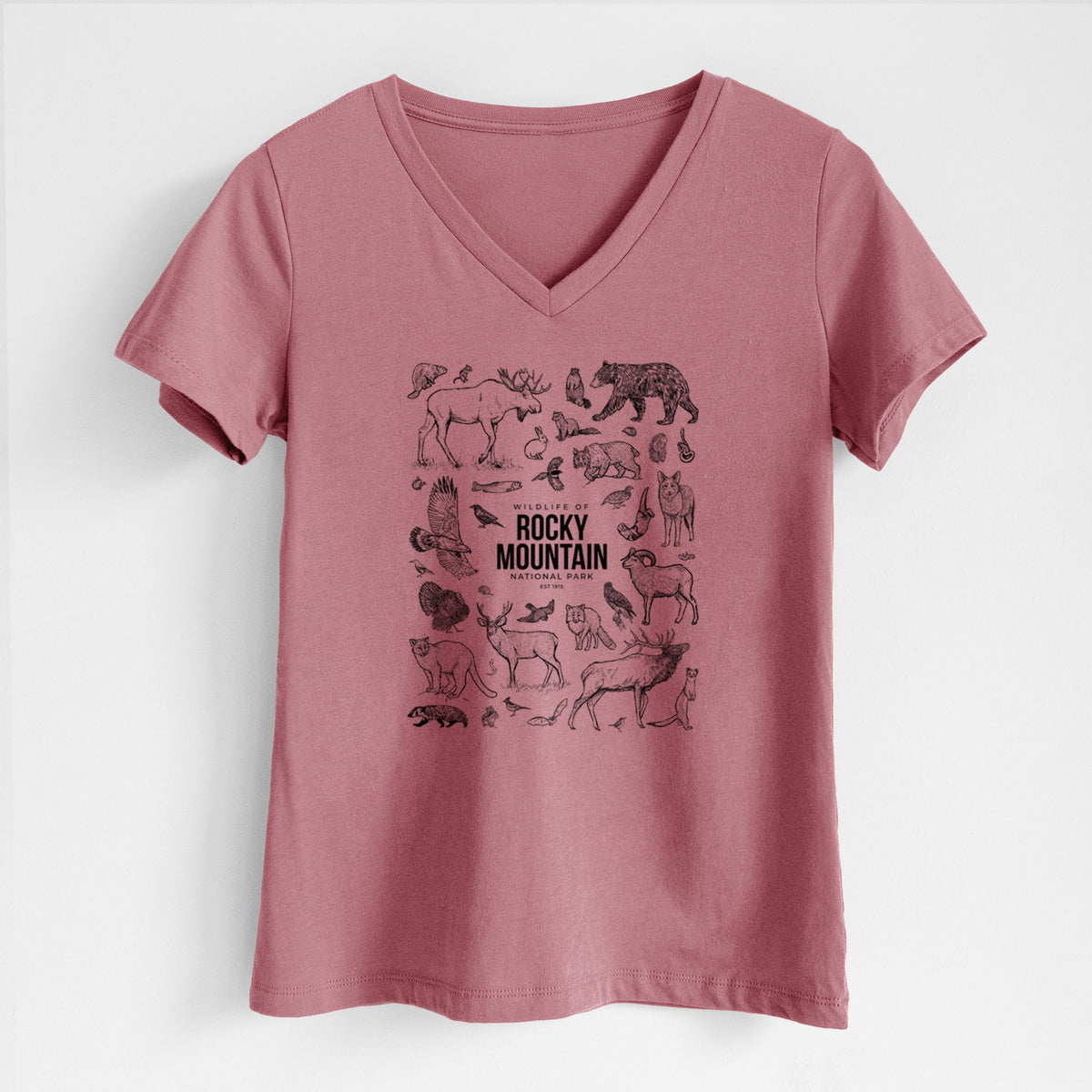 Mauve pink women's relaxed fit cotton V-neck t-shirt laid flat, printed with a collection of black ink wildlife illustrations surrounding the words Rocky Mountain National Park.
