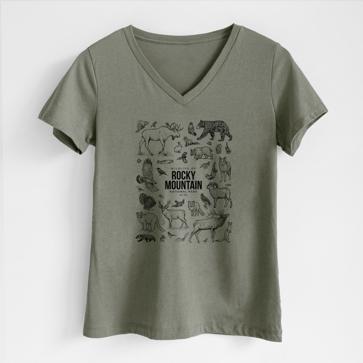 Military green women's relaxed fit cotton V-neck t-shirt laid flat, printed with a collection of black ink wildlife illustrations surrounding the words Rocky Mountain National Park.