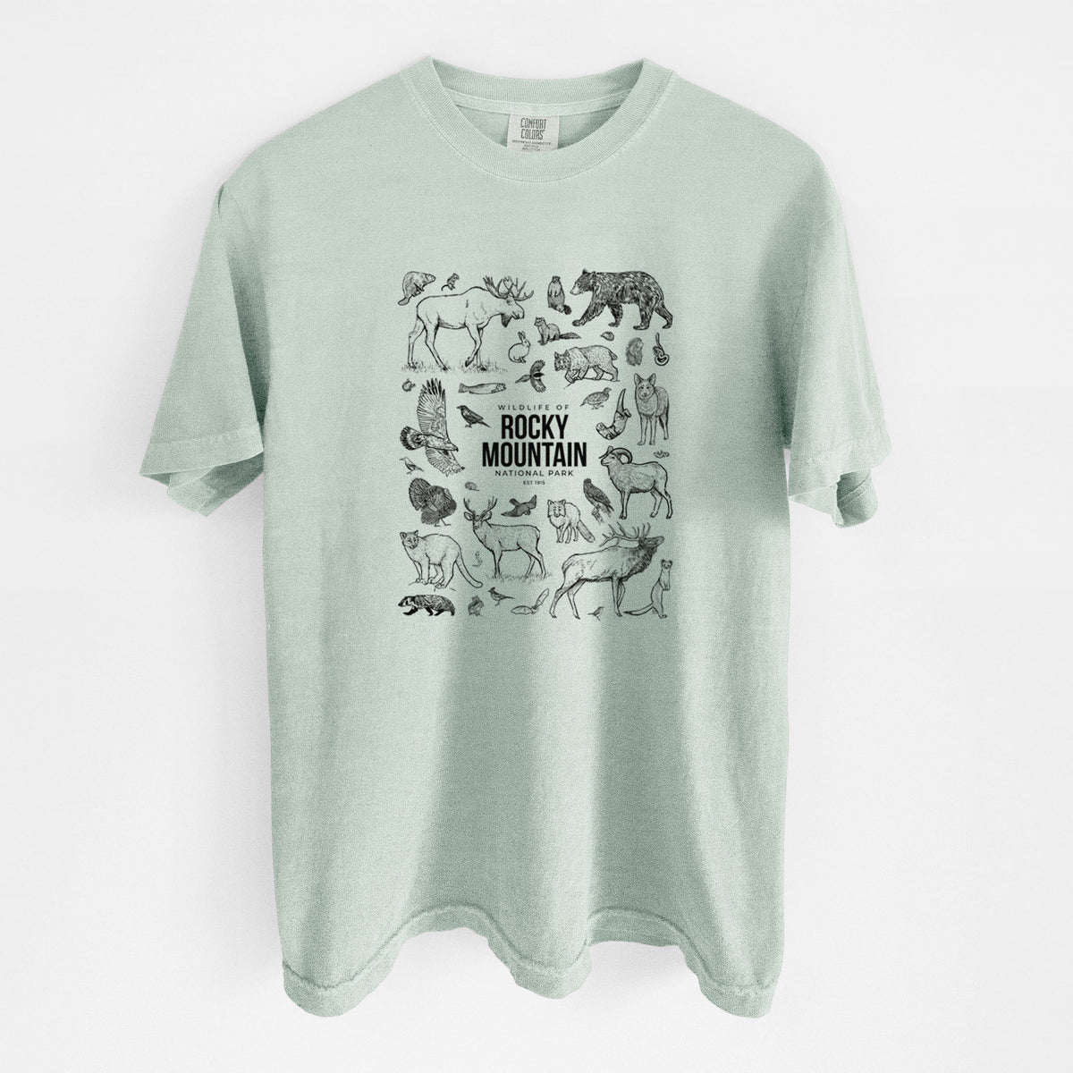 Bay green Comfort Colors t-shirt laid flat, printed with a collection of black ink wildlife illustrations surrounding the words Rocky Mountain National Park.