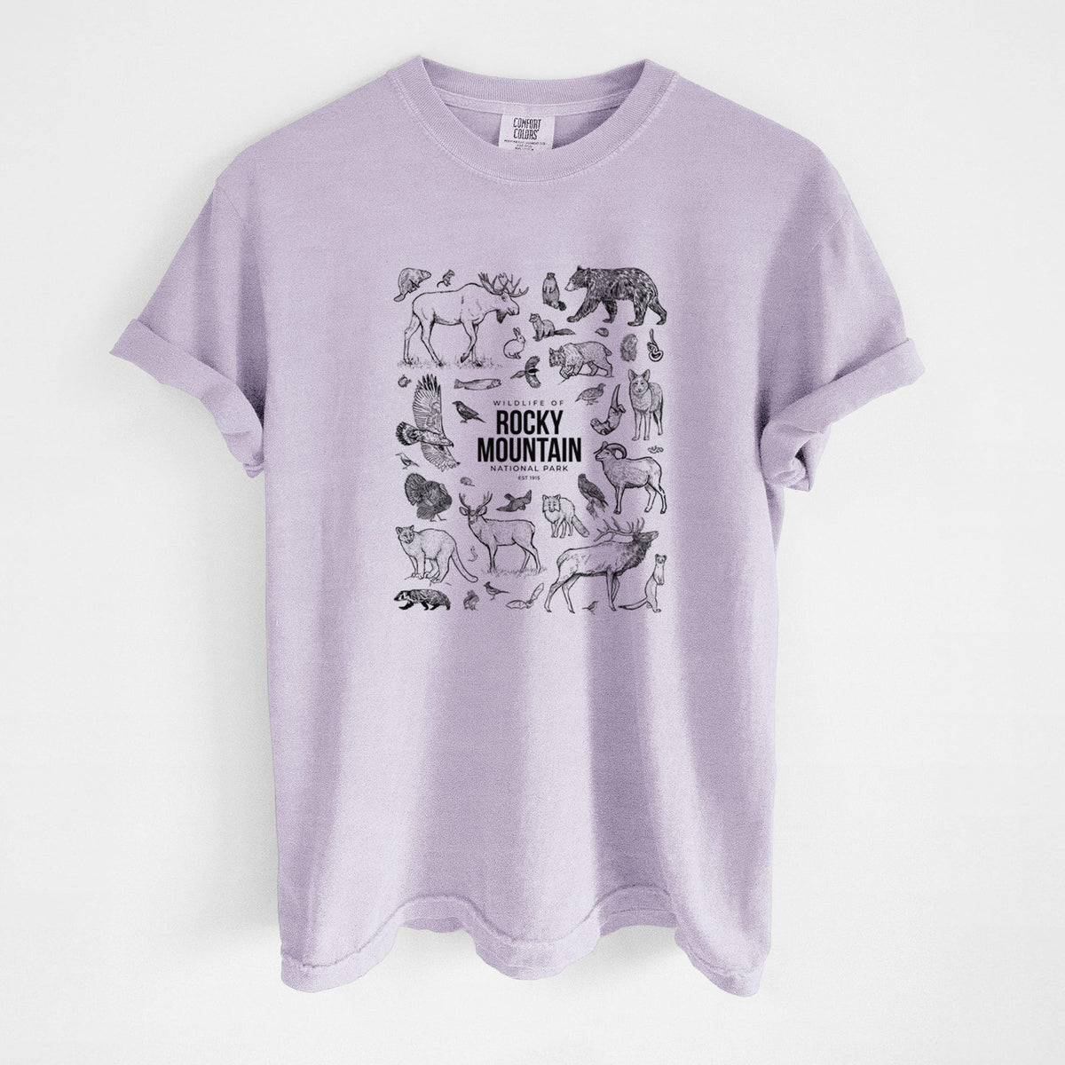 Orchid purple Comfort Colors t-shirt laid flat, printed with a collection of black ink wildlife illustrations surrounding the words Rocky Mountain National Park.