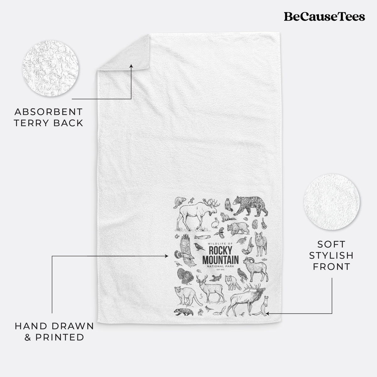 White hand towel printed with a collection of black ink wildlife illustrations surrounding the words Rocky Mountain National Park.