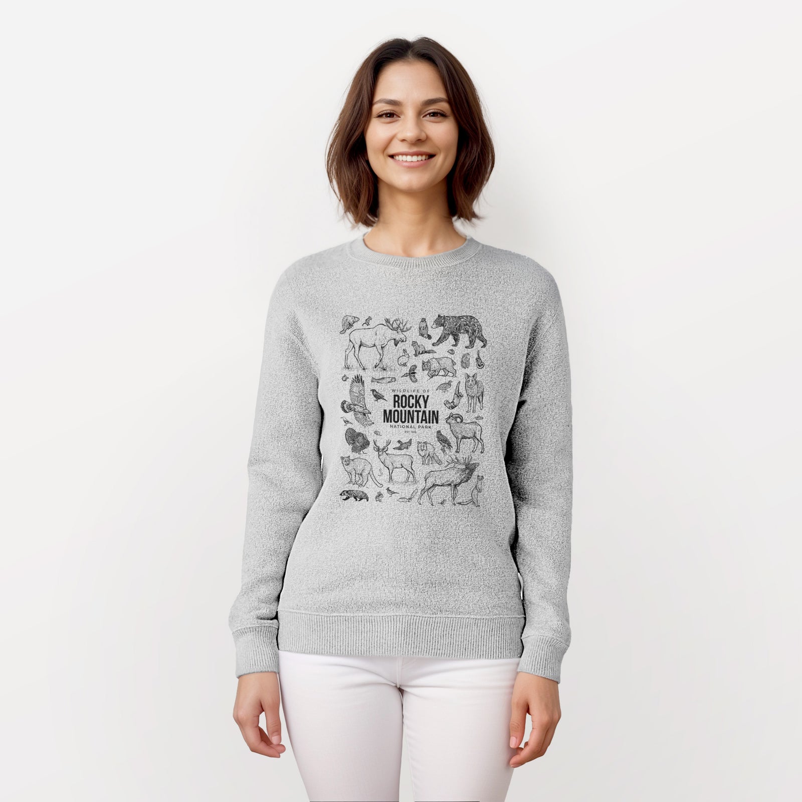 Salt and pepper knit sweatshirt laid flat, printed with a collection of black ink wildlife illustrations surrounding the words Rocky Mountain National Park.