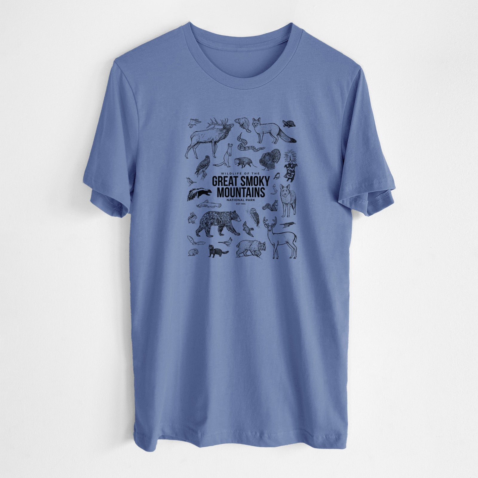 Blue bell lightweight cotton t-shirt laid flat, printed with a collection of black ink wildlife illustrations surrounding the words Great Smoky Mountains National Park.