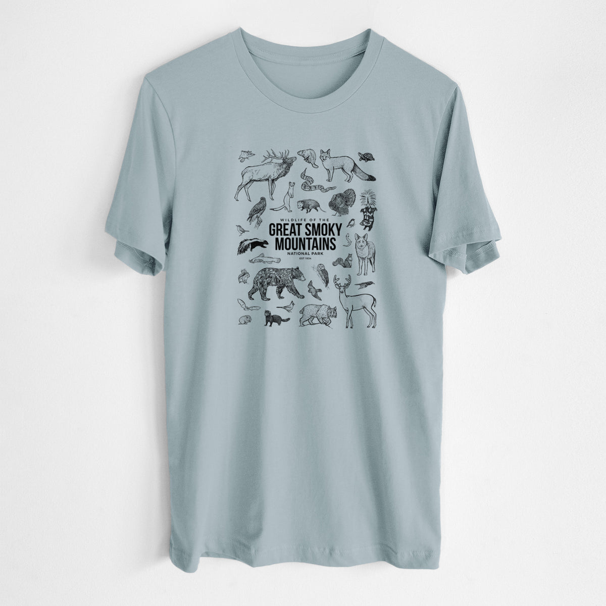 Vintage denim lightweight cotton t-shirt laid flat, printed with a collection of black ink wildlife illustrations surrounding the words Great Smoky Mountains National Park.