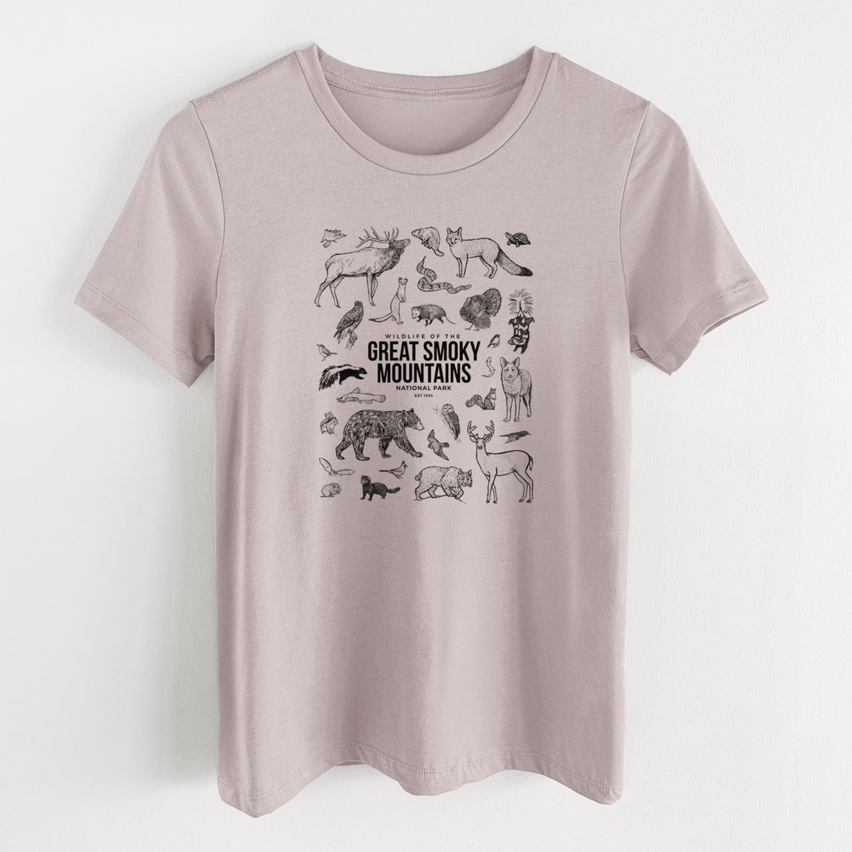 Pink gravel women's relaxed fit cotton t-shirt laid flat, printed with a collection of black ink wildlife illustrations surrounding the words Great Smoky Mountains National Park.