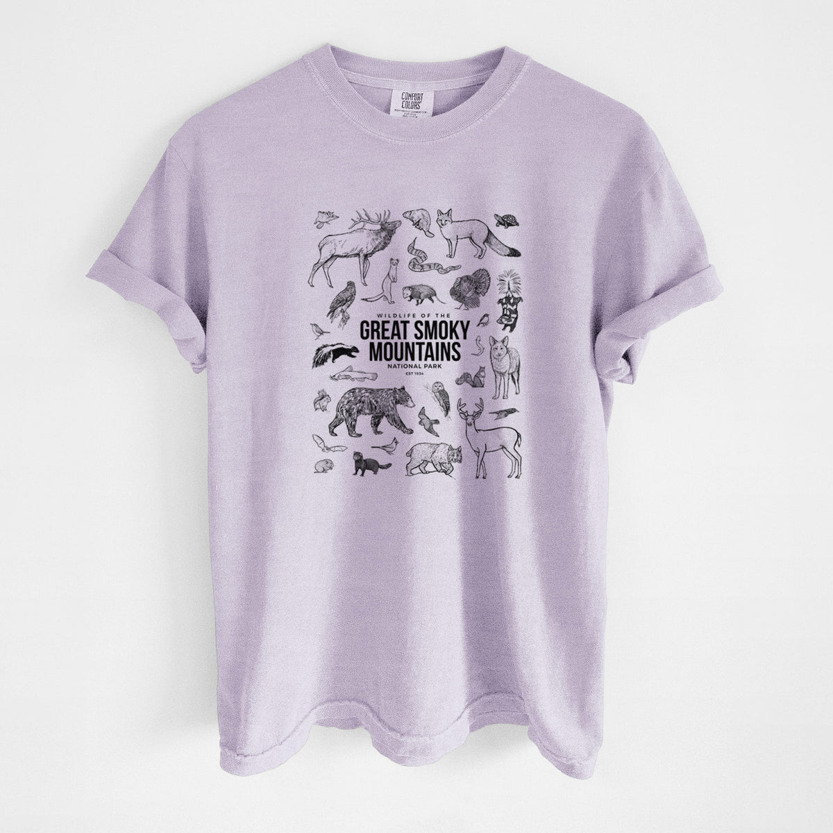 Orchid purple Comfort Colors t-shirt laid flat, printed with a collection of black ink wildlife illustrations surrounding the words Great Smoky Mountains National Park.