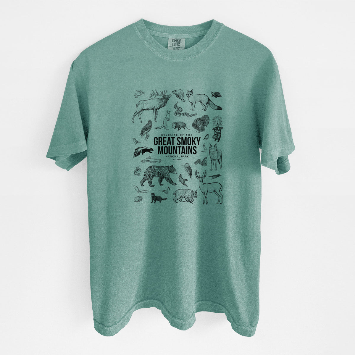 Reef green Comfort Colors t-shirt laid flat, printed with a collection of black ink wildlife illustrations surrounding the words Great Smoky Mountains National Park.