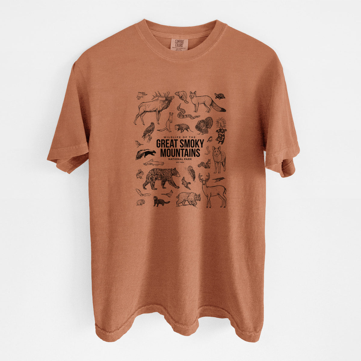 Yam burnt orange Comfort Colors t-shirt laid flat, printed with a collection of black ink wildlife illustrations surrounding the words Great Smoky Mountains National Park.