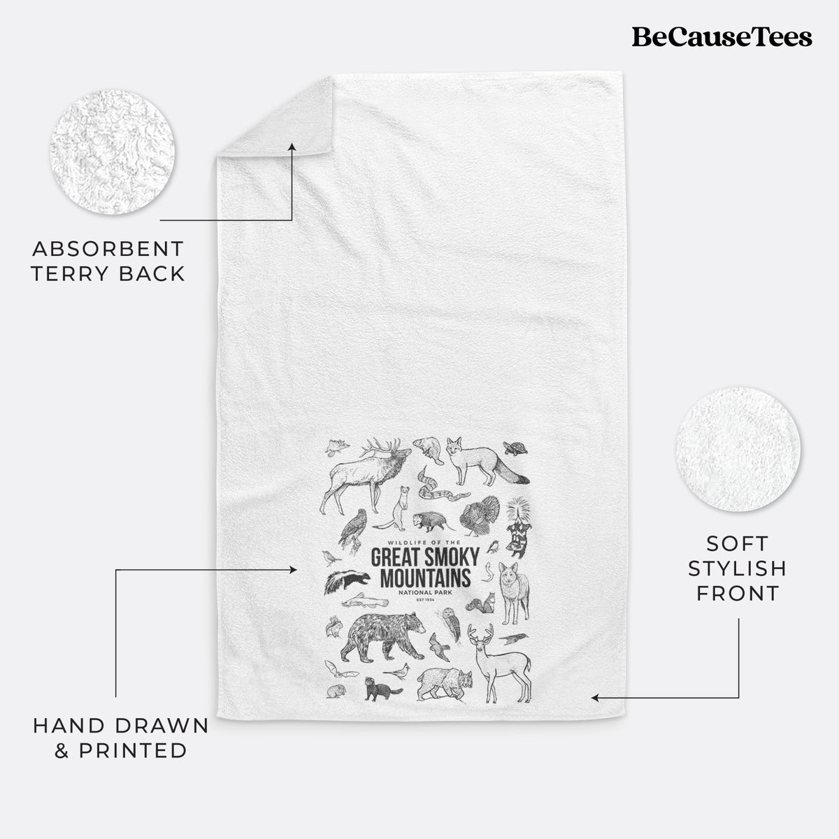 White hand towel printed with a collection of black ink wildlife illustrations surrounding the words Great Smoky Mountains National Park.