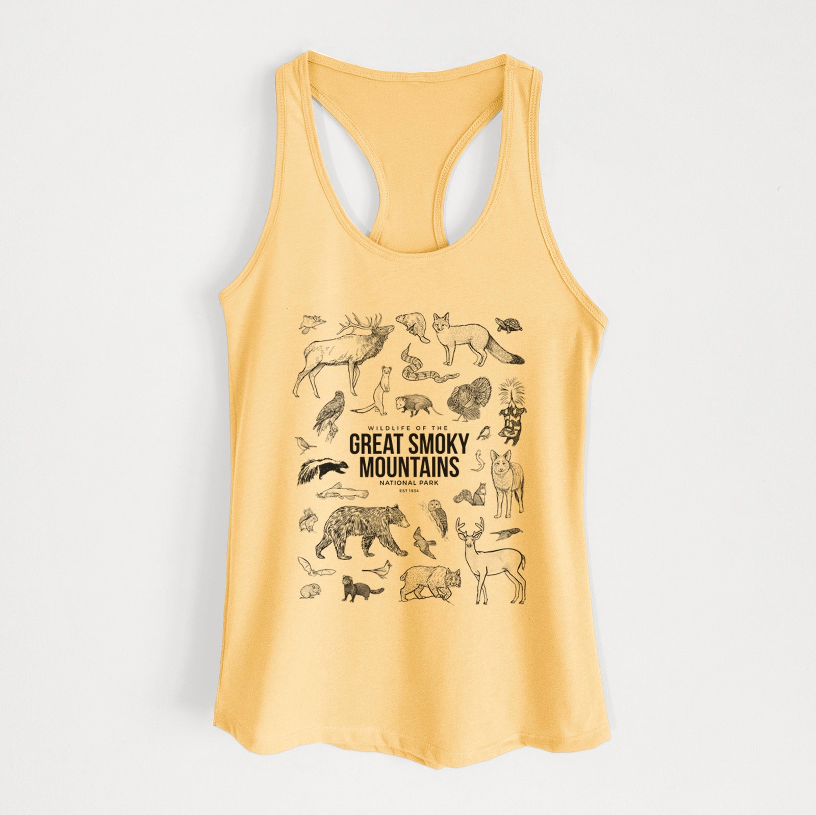 Banana cream women's racerback tank top laid flat, printed with a collection of black ink wildlife illustrations surrounding the words Great Smoky Mountains National Park.