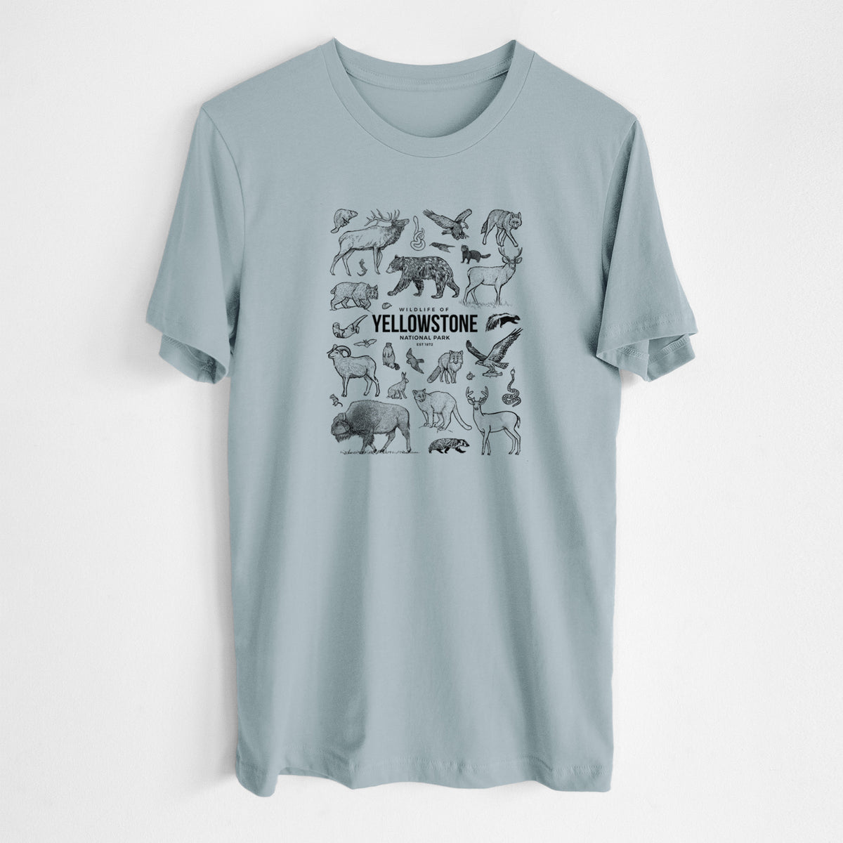 Vintage denim lightweight cotton t-shirt laid flat, printed with a collection of black ink wildlife illustrations surrounding the words Yellowstone National Park.