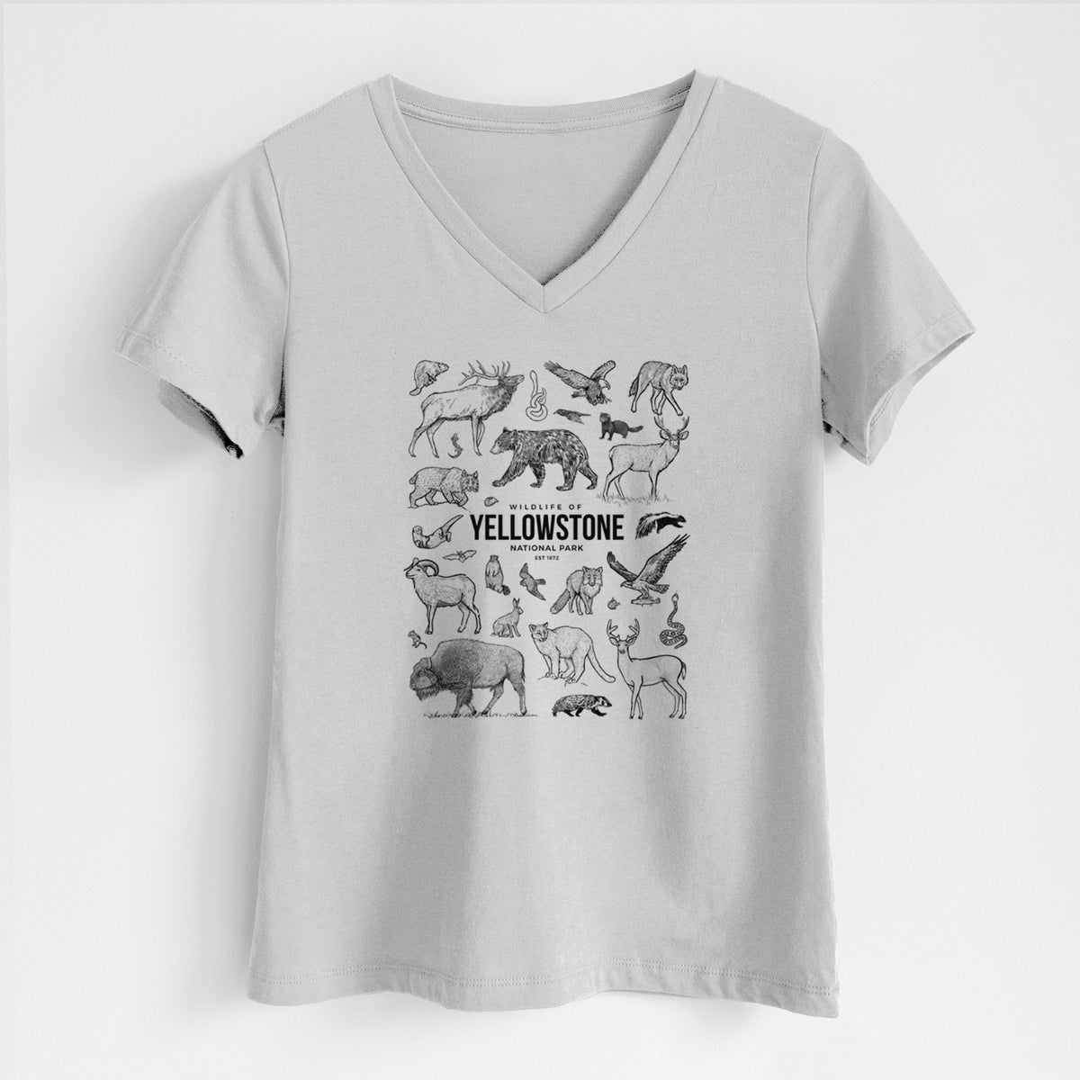 Lunar grey women's relaxed fit cotton V-neck t-shirt laid flat, printed with a collection of black ink wildlife illustrations surrounding the words Yellowstone National Park.