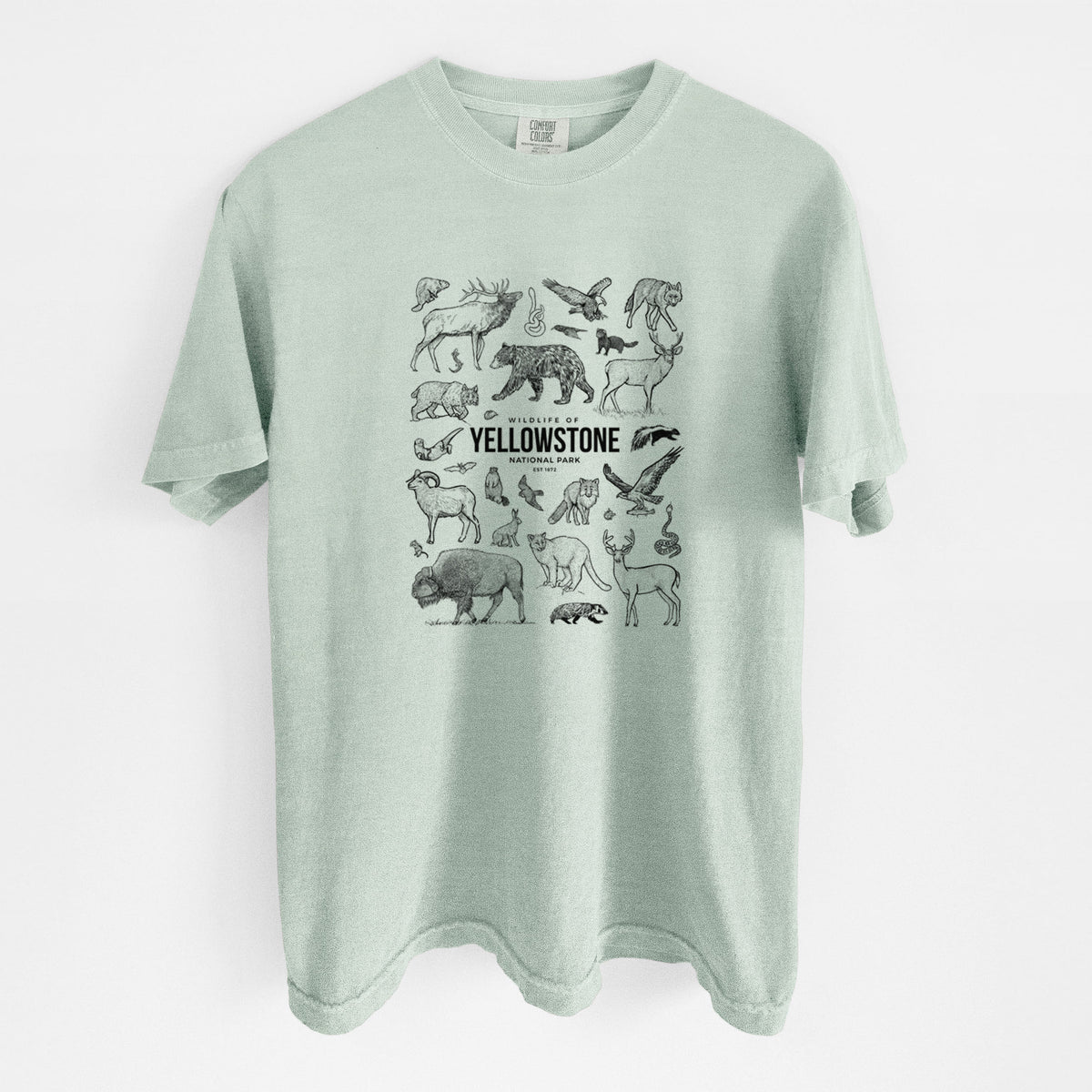 Bay green Comfort Colors t-shirt laid flat, printed with a collection of black ink wildlife illustrations surrounding the words Yellowstone National Park.