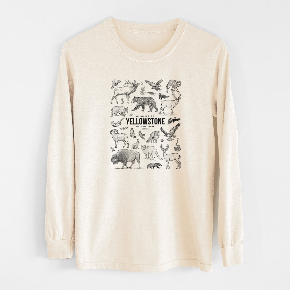 Ivory Comfort Colors long sleeve shirt laid flat, printed with a collection of black ink wildlife illustrations surrounding the words Yellowstone National Park.