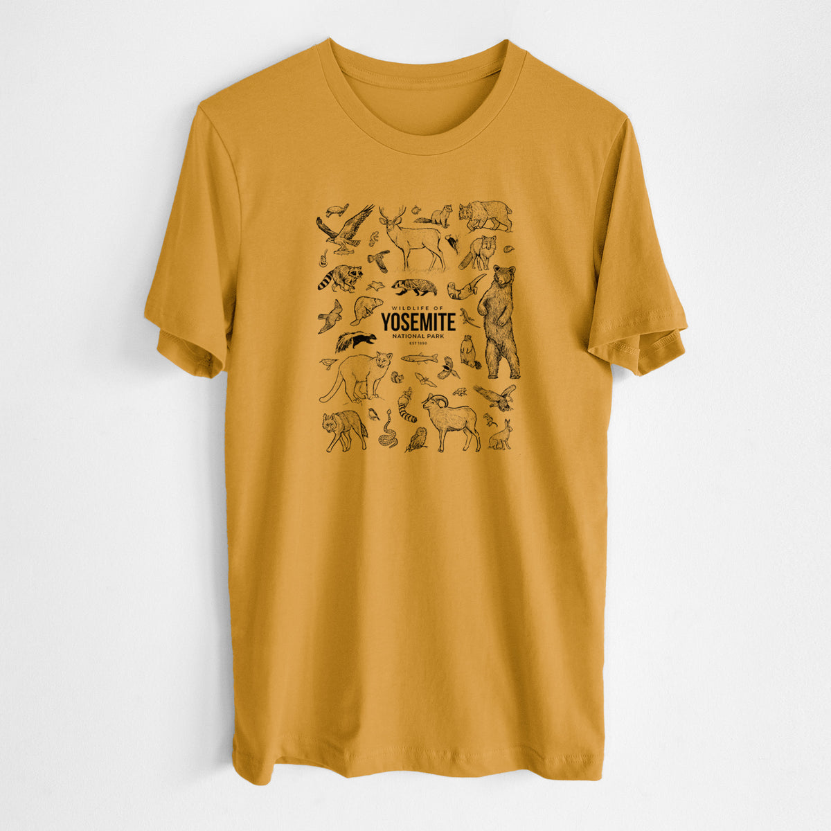 Honeycomb yellow lightweight cotton t-shirt laid flat, printed with a collection of black ink wildlife illustrations surrounding the words Yosemite National Park.