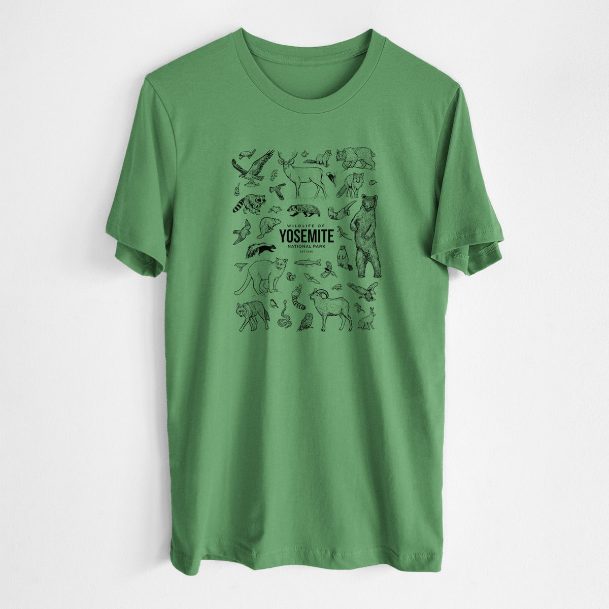 Leaf green lightweight cotton t-shirt laid flat, printed with a collection of black ink wildlife illustrations surrounding the words Yosemite National Park.
