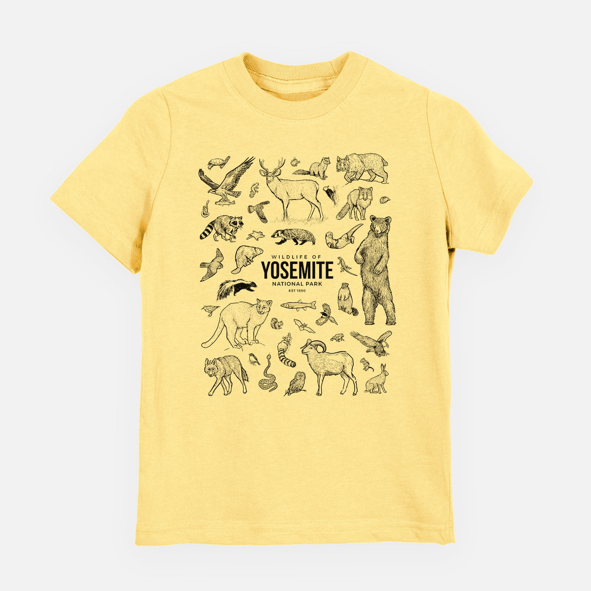 Butter yellow youth t-shirt laid flat, printed with a collection of black ink wildlife illustrations surrounding the words Yosemite National Park.