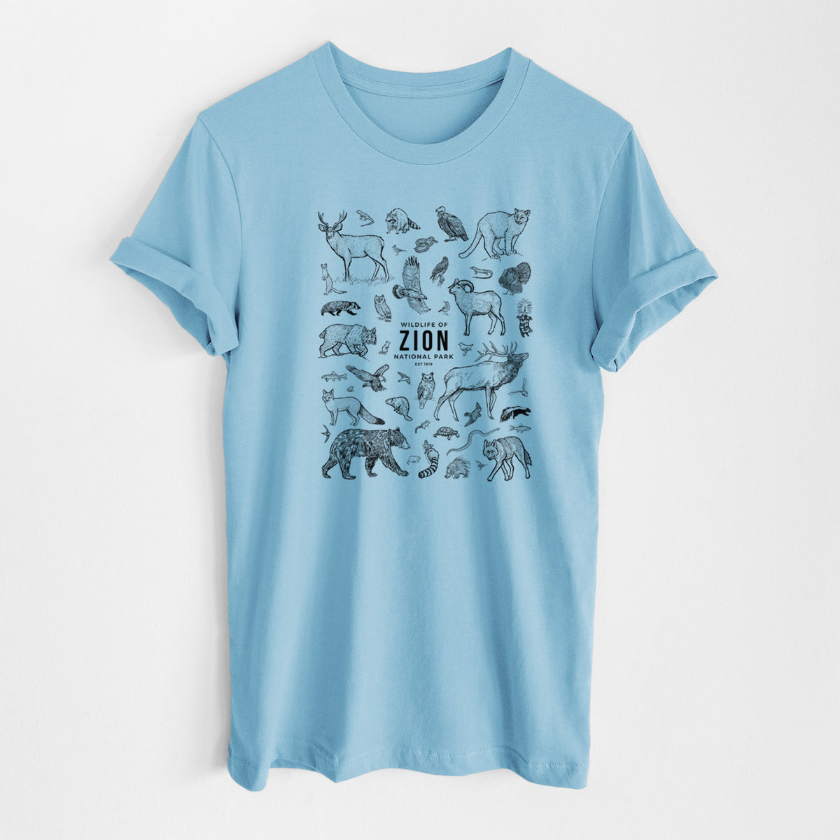 Ocean blue lightweight cotton t-shirt laid flat, printed with a collection of black ink wildlife illustrations surrounding the words Zion National Park.