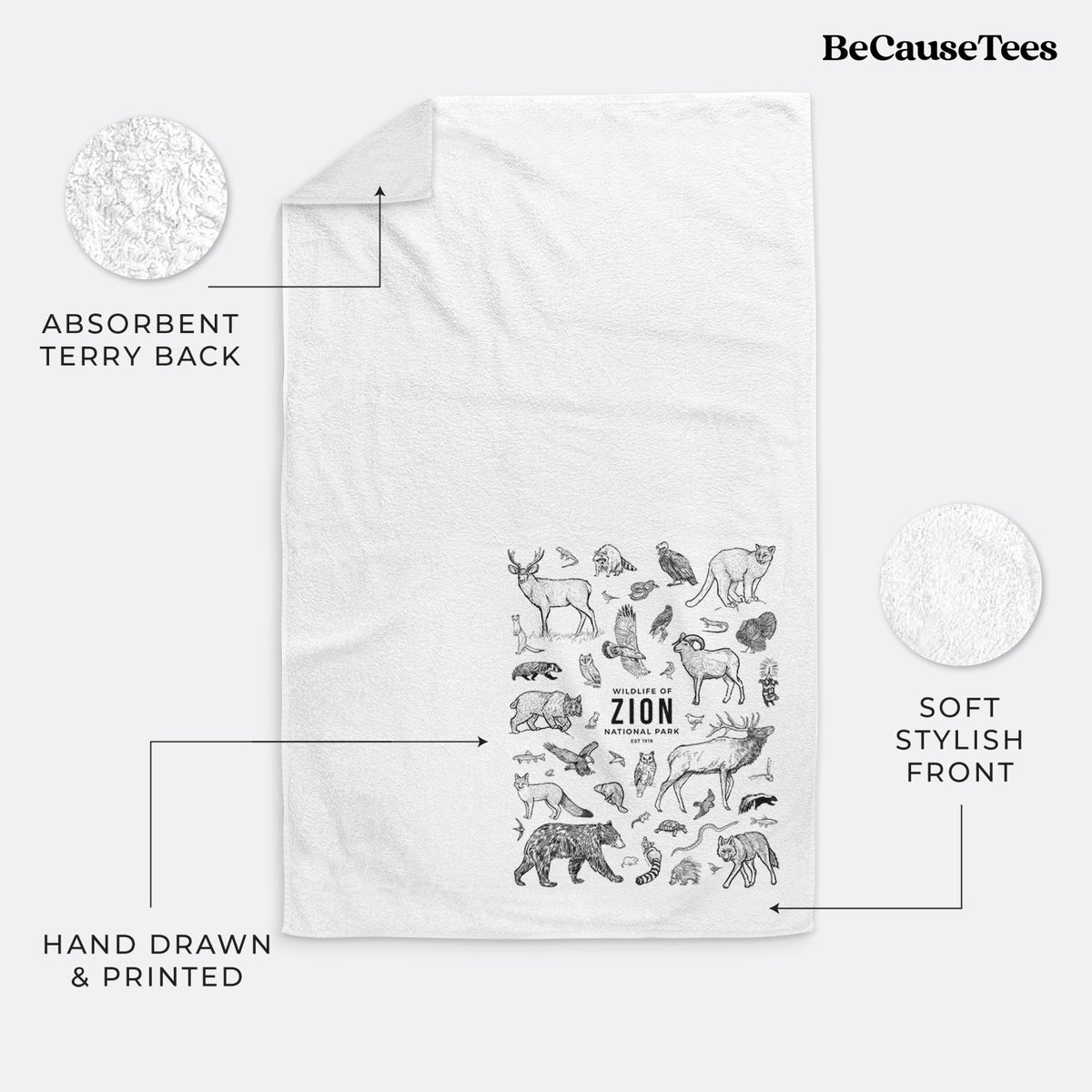White hand towel printed with a collection of black ink wildlife illustrations surrounding the words Zion National Park.