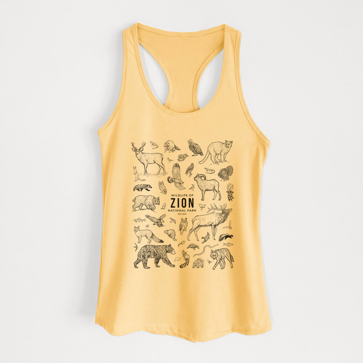 Banana cream women's racerback tank top laid flat, printed with a collection of black ink wildlife illustrations surrounding the words Zion National Park.