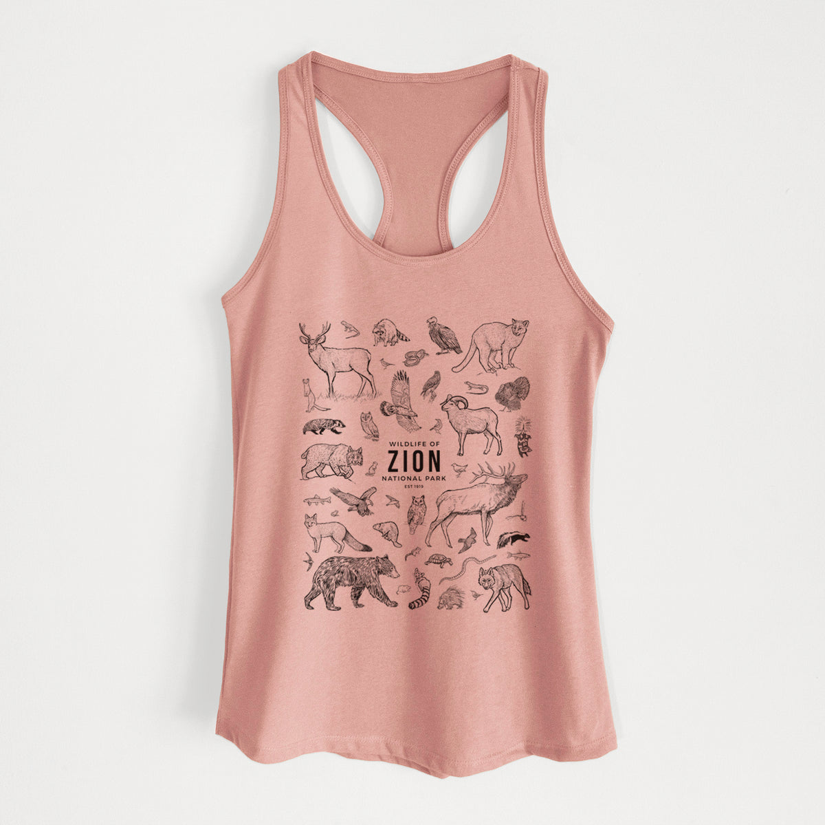 Desert pink women's racerback tank top laid flat, printed with a collection of black ink wildlife illustrations surrounding the words Zion National Park.