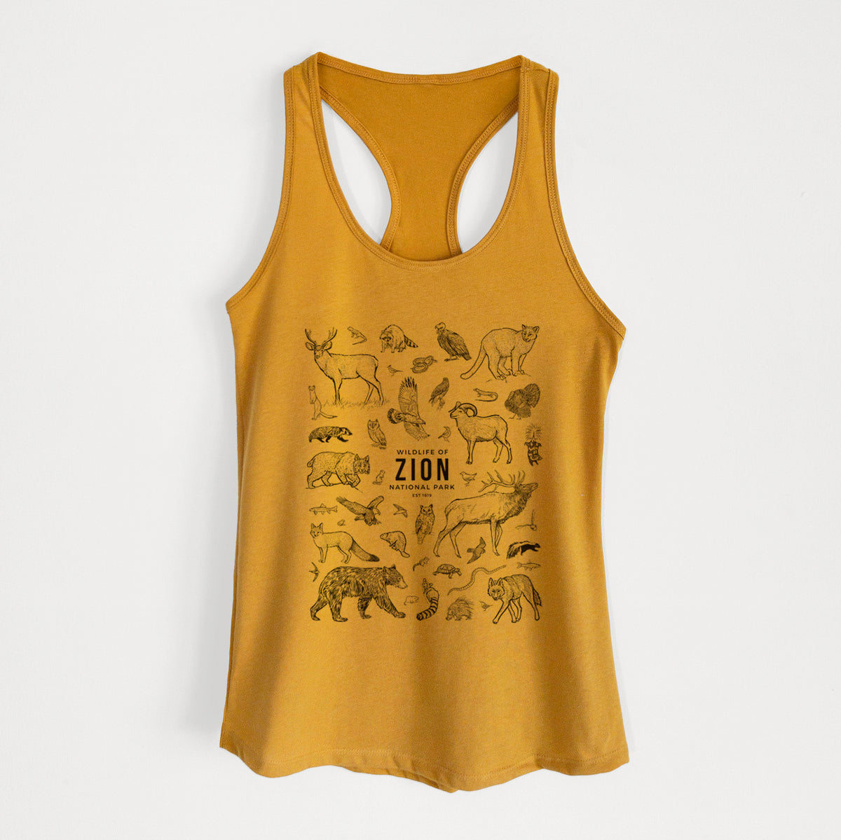 Gold women's racerback tank top laid flat, printed with a collection of black ink wildlife illustrations surrounding the words Zion National Park.