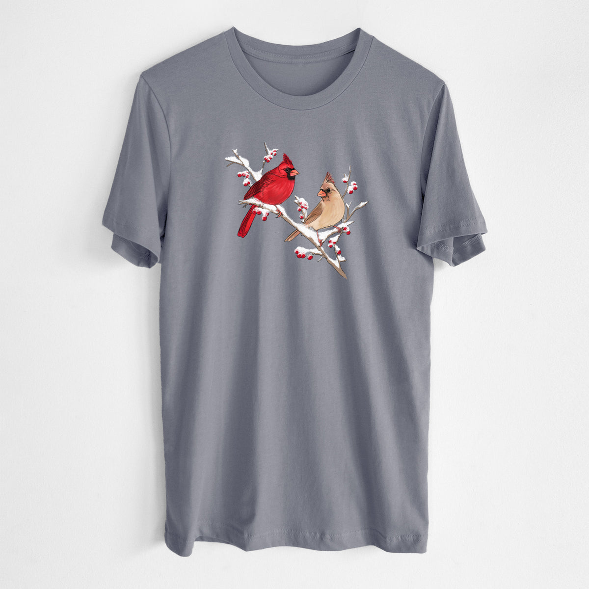 Storm grey lightweight cotton t-shirt laid flat, printed with a full-color illustration of a male and female northern cardinal perched on a snowy branch with red berries.