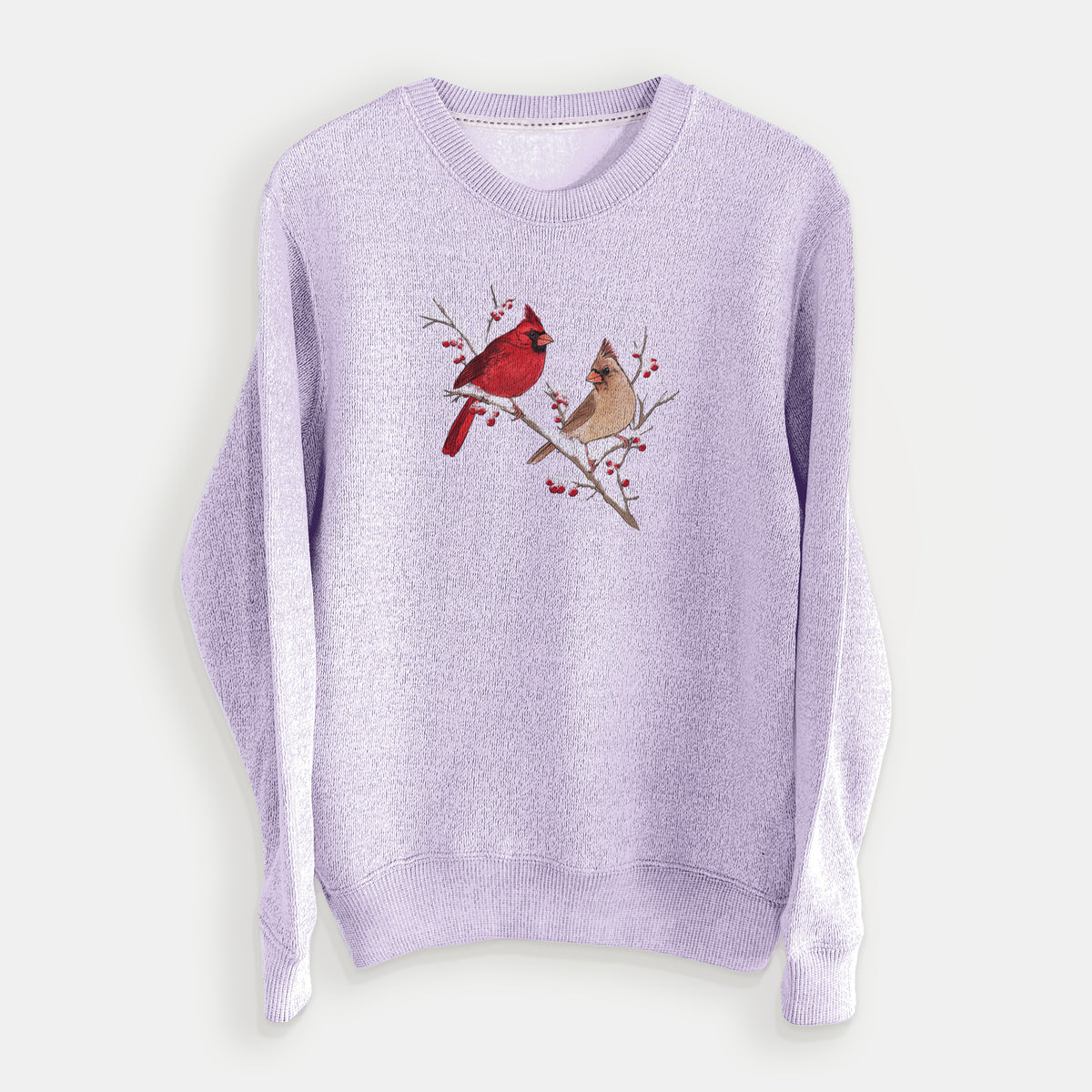 Ice purple knit sweatshirt laid flat, printed with a full-color illustration of a male and female northern cardinal perched on a snowy branch with red berries.