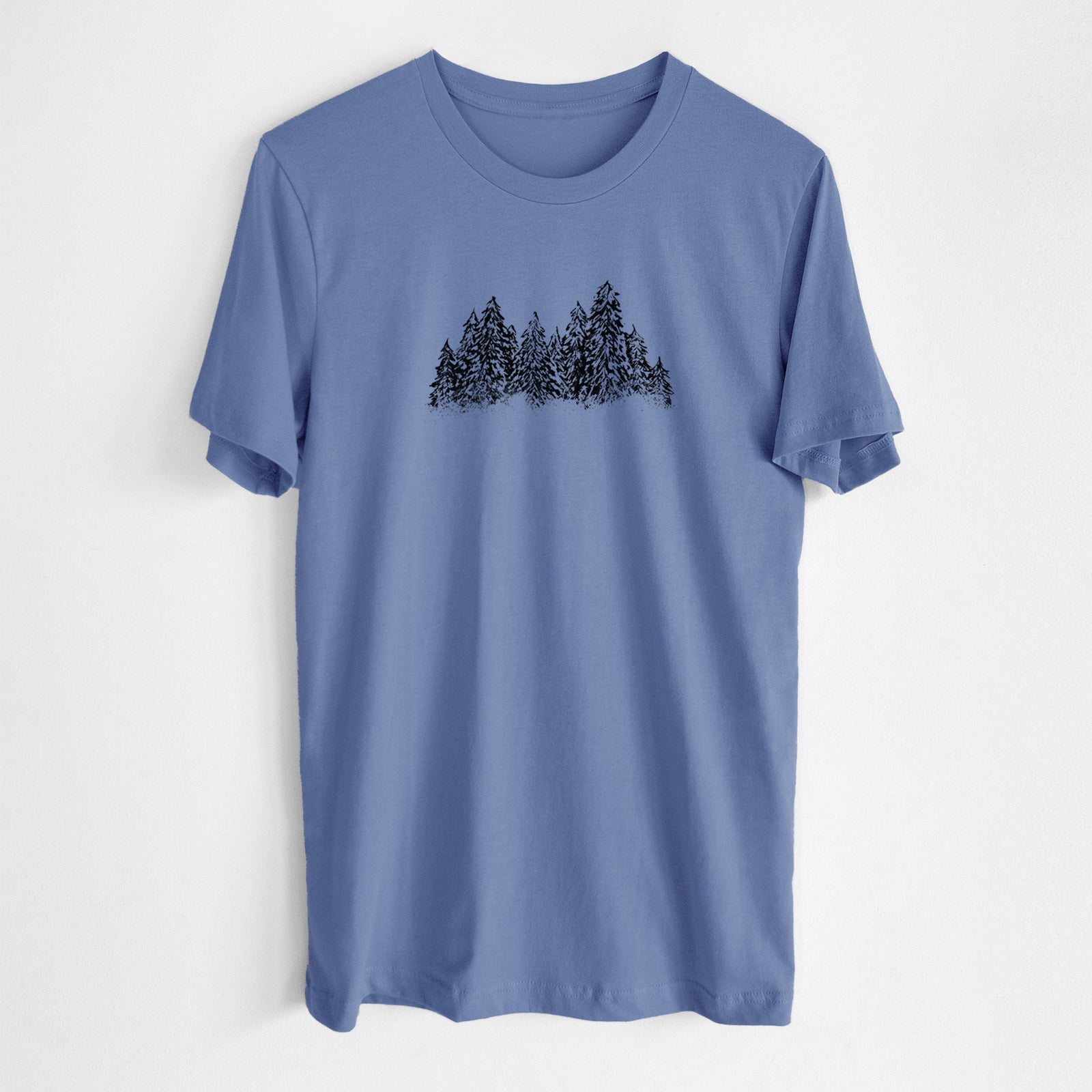 Blue bell lightweight cotton t-shirt laid flat, printed with a black ink illustration of a row of snow-dusted evergreen trees.
