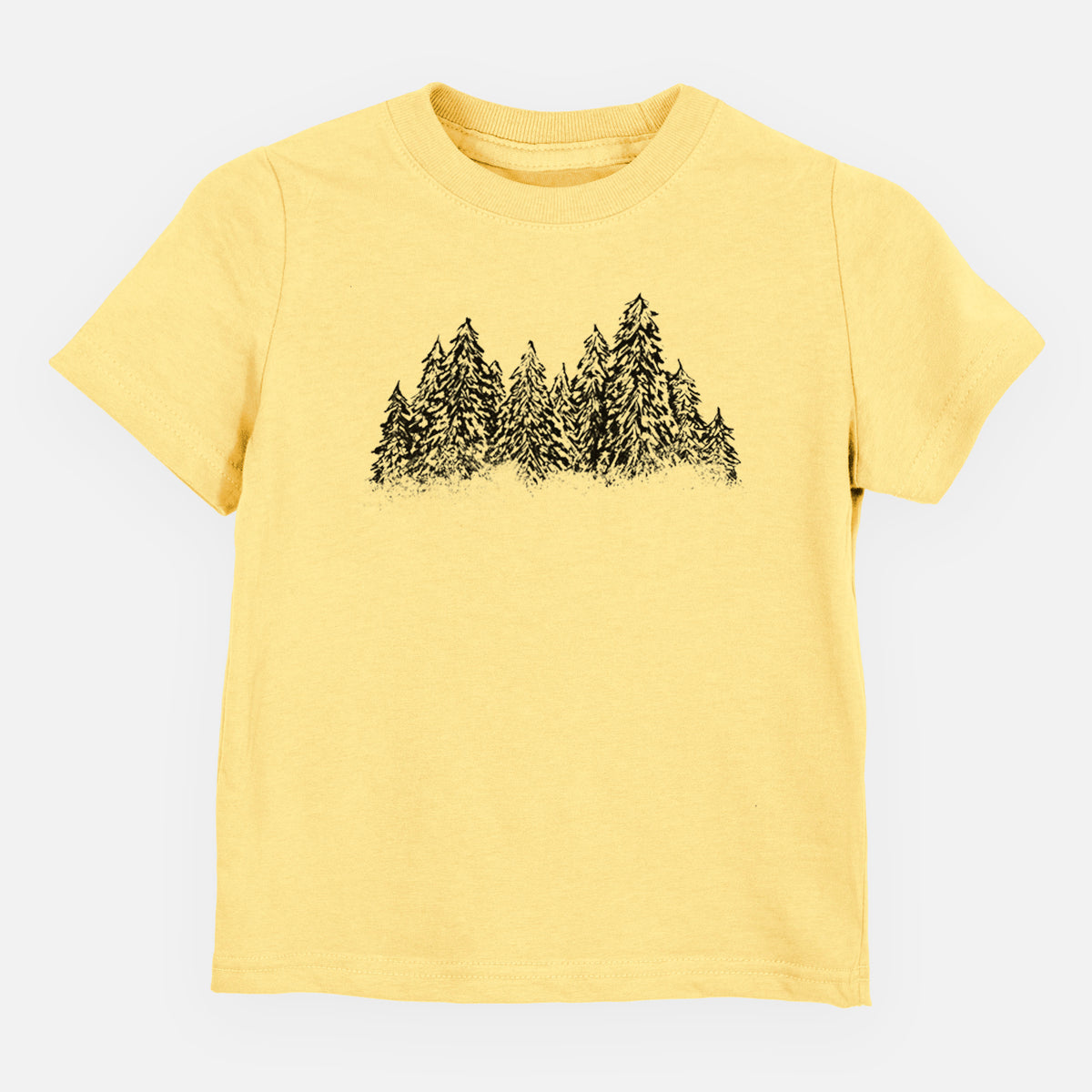 Butter yellow toddler t-shirt laid flat, printed with a black ink illustration of a row of snow-dusted evergreen trees.