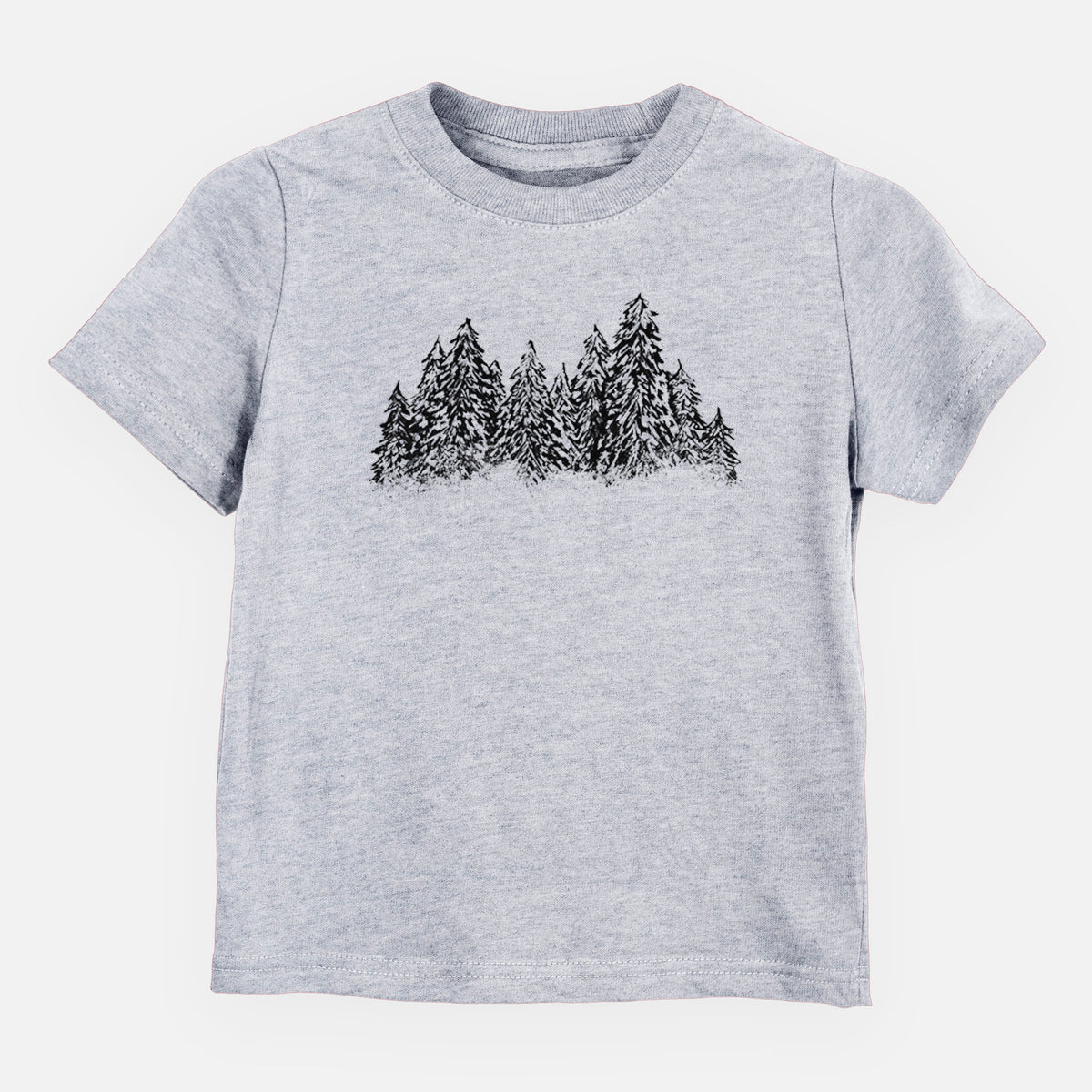 Heather grey toddler t-shirt laid flat, printed with a black ink illustration of a row of snow-dusted evergreen trees.