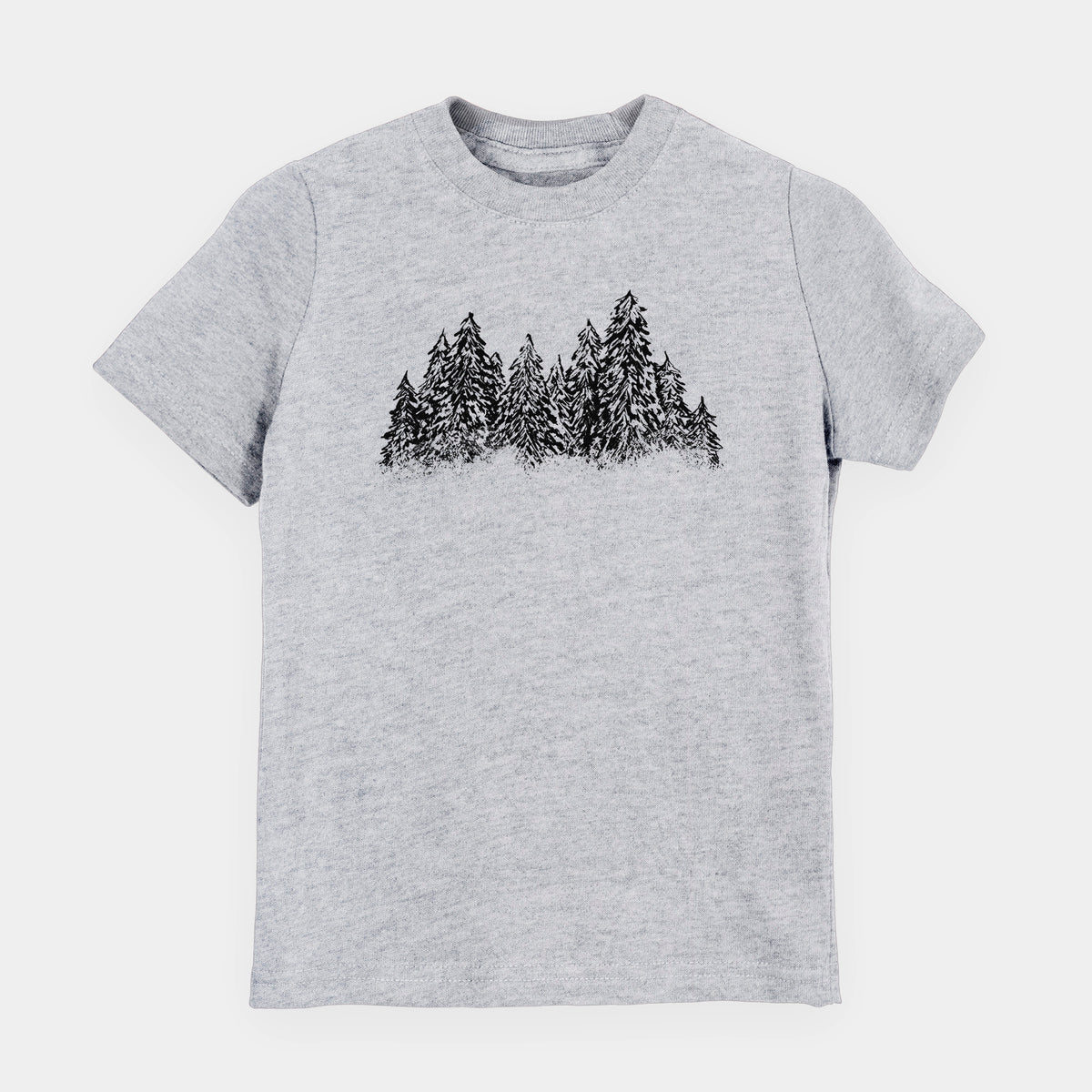 Heather grey youth t-shirt laid flat, printed with a black ink illustration of a row of snow-dusted evergreen trees.