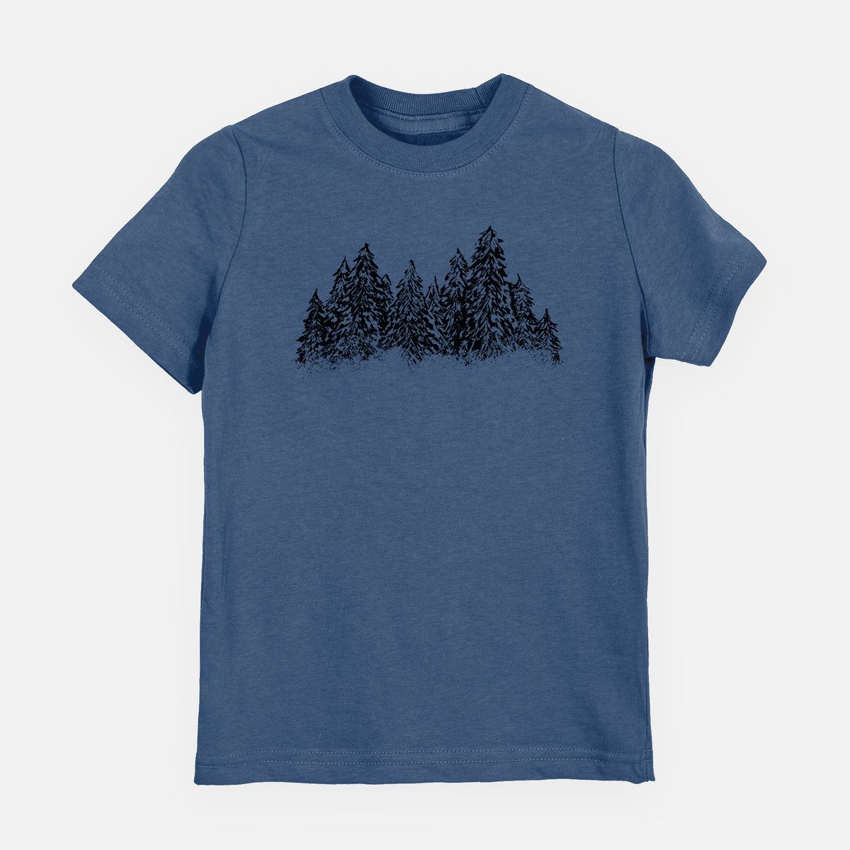 Indigo blue youth t-shirt laid flat, printed with a black ink illustration of a row of snow-dusted evergreen trees.