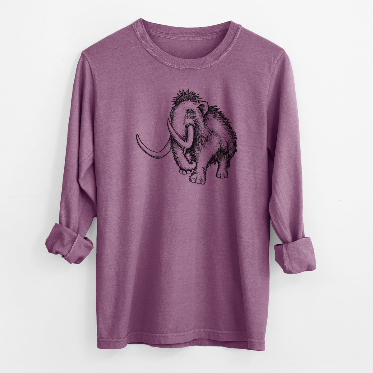 Berry pink Comfort Colors long sleeve shirt laid flat with the cuffs rolled, printed with a black ink illustration of a woolly mammoth with long curved tusks.