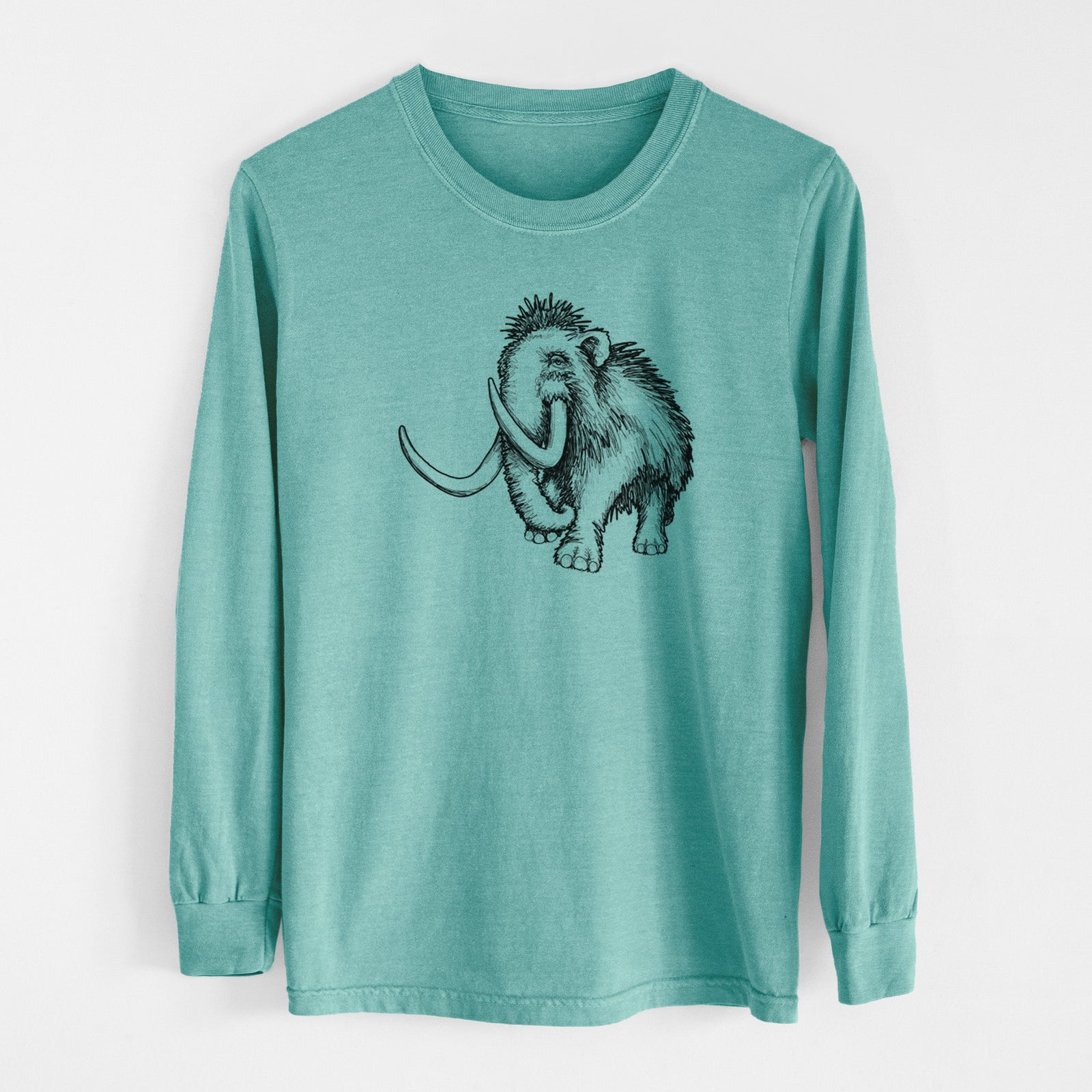 Reef green Comfort Colors long sleeve shirt laid flat, printed with a black ink illustration of a woolly mammoth with long curved tusks.