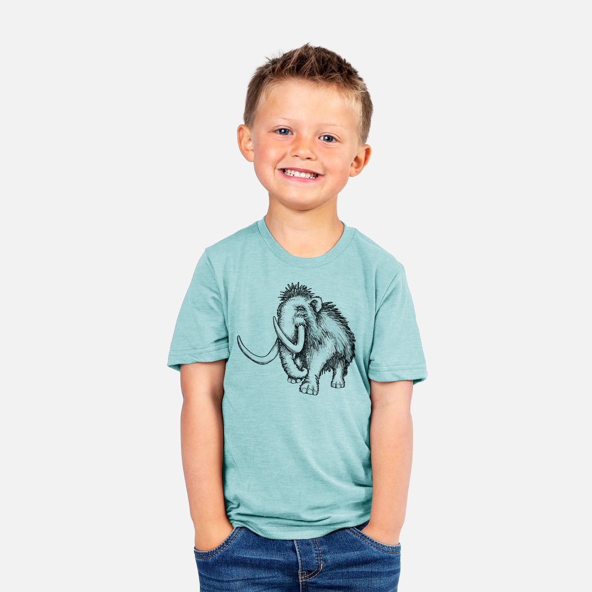 Smiling boy wearing a youth t-shirt printed with a black ink illustration of a woolly mammoth with long curved tusks.