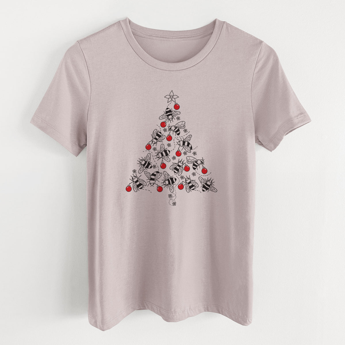 Pink gravel women's relaxed fit cotton t-shirt laid flat, printed with a Christmas tree made of black ink bees with red ornaments and a star on top.
