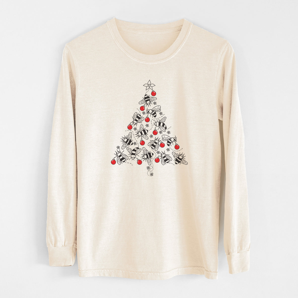 Ivory Comfort Colors long sleeve shirt laid flat, printed with a Christmas tree made of black ink bees with red ornaments and a star on top.