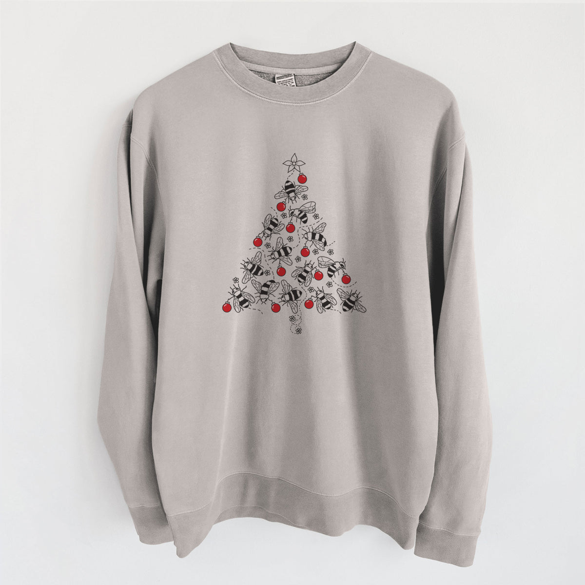 Cement grey pigment dyed crewneck sweatshirt laid flat, printed with a Christmas tree made of black ink bees with red ornaments and a star on top.
