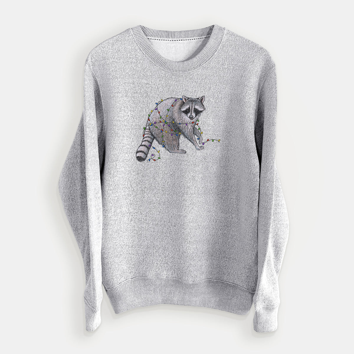 Salt and pepper knit sweatshirt laid flat, printed with a black ink raccoon tangled in a string of colorful holiday lights.