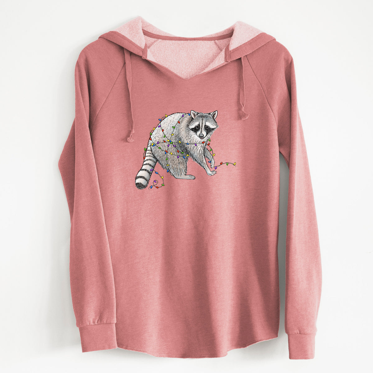 Dusty rose women's Cali Wave hooded sweatshirt laid flat, printed with a black ink raccoon tangled in a string of colorful holiday lights.