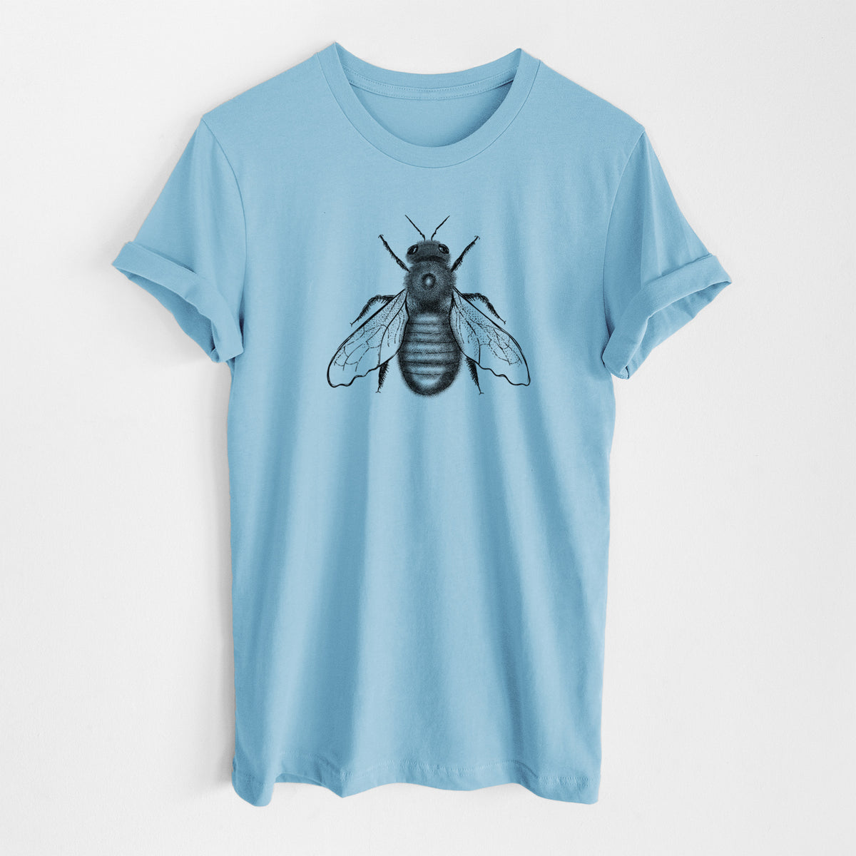 Ocean blue lightweight cotton t-shirt laid flat, printed with a detailed black ink illustration of an eastern carpenter bee with its wings spread, seen from above.