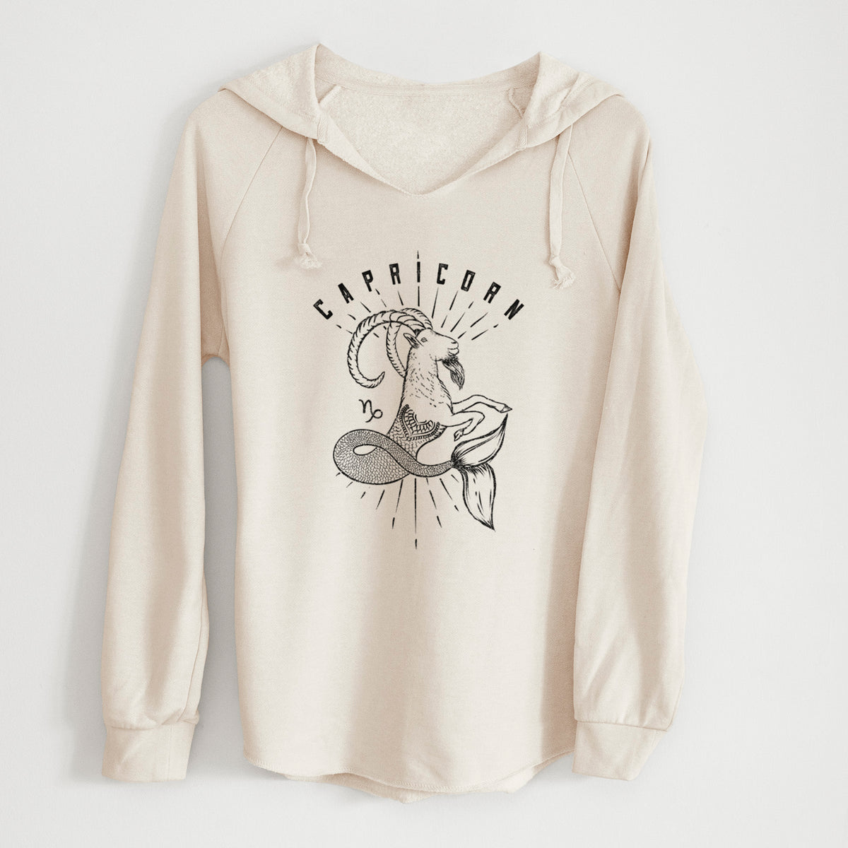 Bone cream women's Cali Wave hooded sweatshirt laid flat, printed with a black ink sea-goat with the word Capricorn, for the Capricorn zodiac sign.