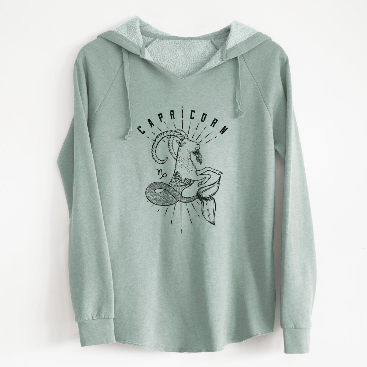 Sage green women's Cali Wave hooded sweatshirt laid flat, printed with a black ink sea-goat with the word Capricorn, for the Capricorn zodiac sign.