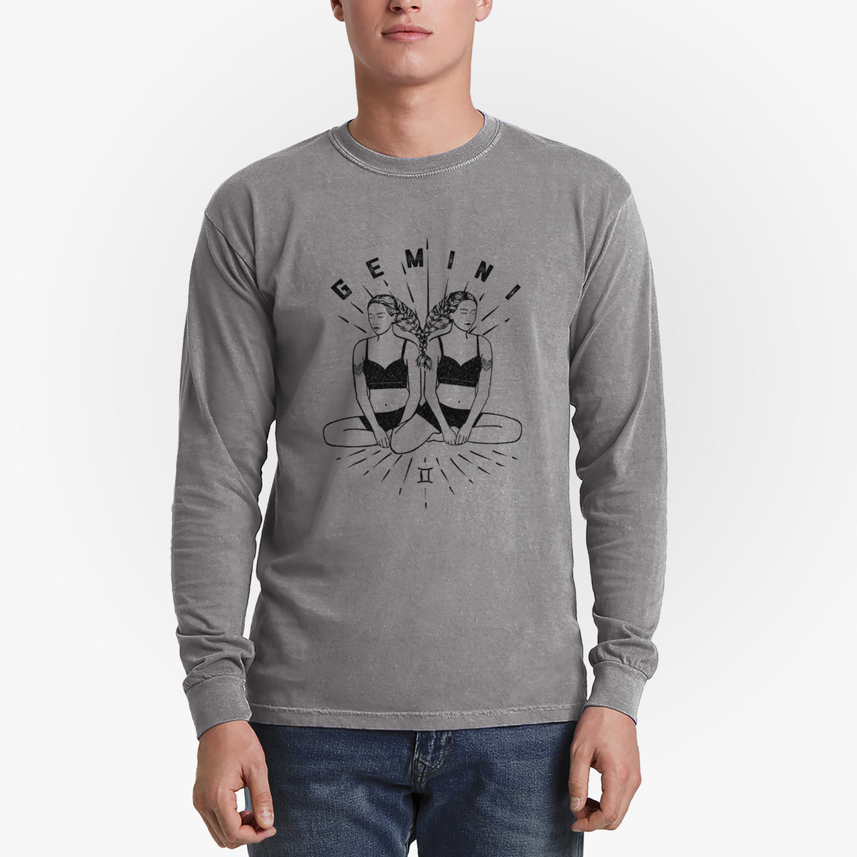 Man wearing a grey Comfort Colors long sleeve shirt printed with black ink twin women sitting back to back with the word Gemini, for the Gemini zodiac sign.