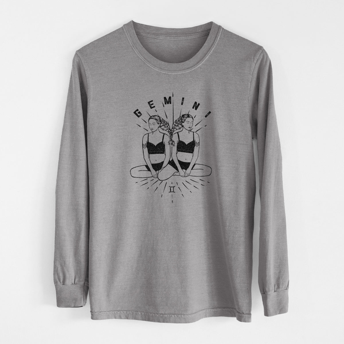 Grey Comfort Colors long sleeve shirt laid flat, printed with black ink twin women sitting back to back with the word Gemini, for the Gemini zodiac sign.