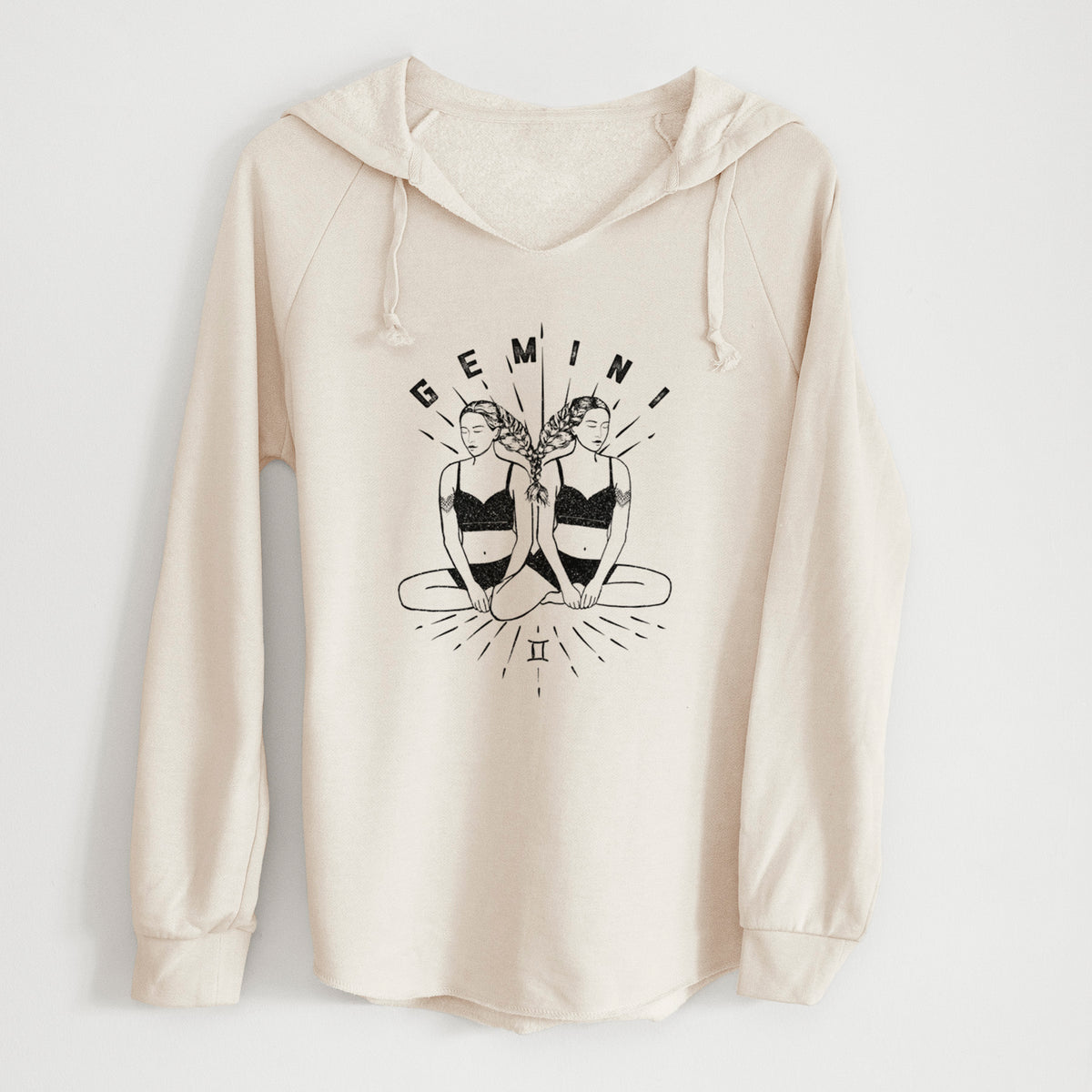 Bone cream women's Cali Wave hooded sweatshirt laid flat, printed with black ink twin women sitting back to back with the word Gemini, for the Gemini zodiac sign.