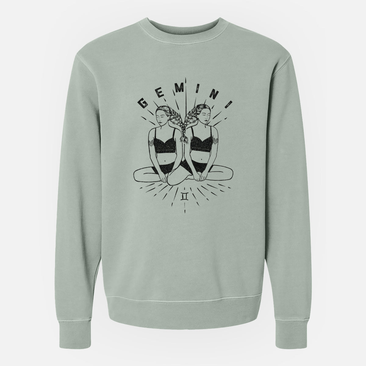 Sage green pigment dyed crewneck sweatshirt laid flat, printed with black ink twin women sitting back to back with the word Gemini, for the Gemini zodiac sign.