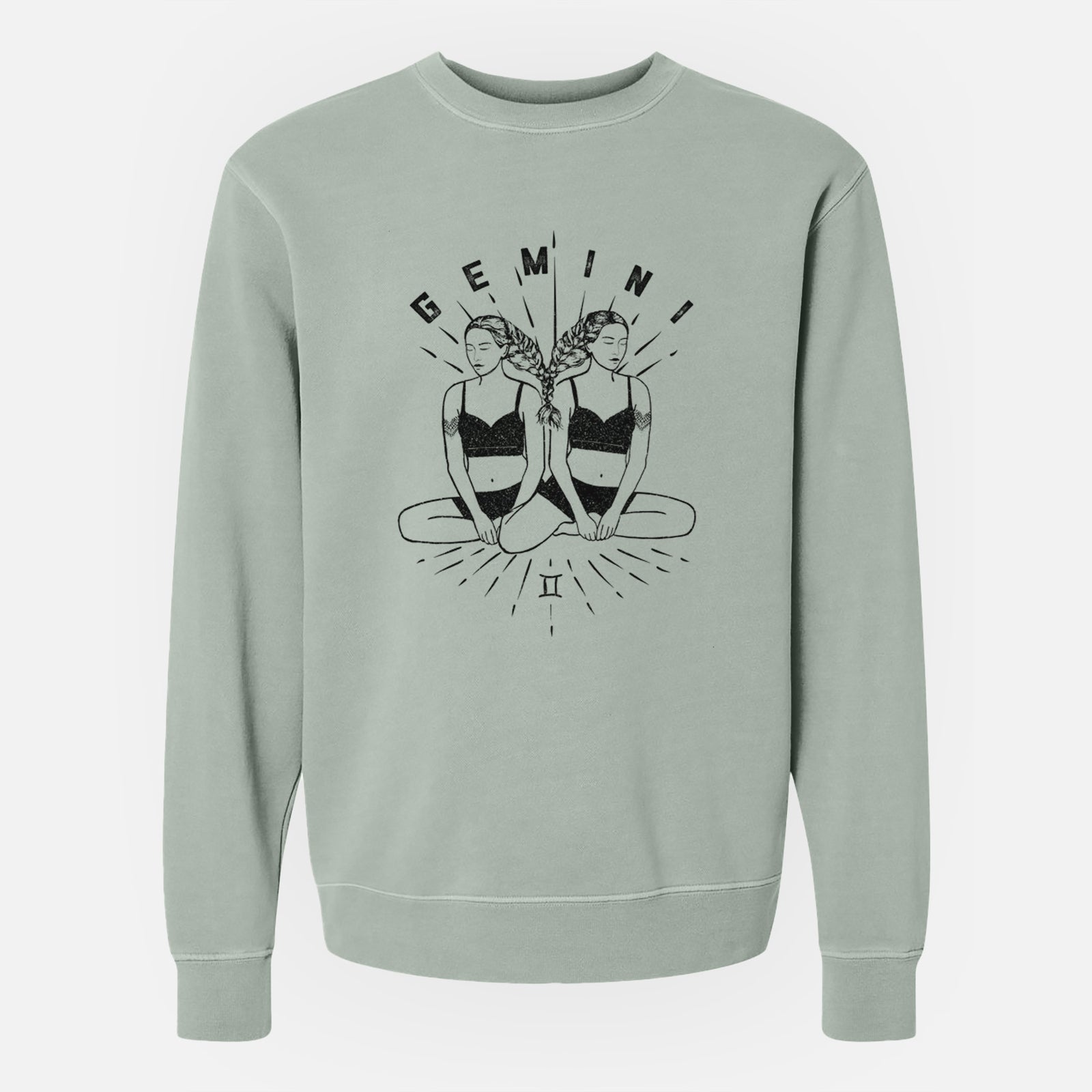 Sage green pigment dyed crewneck sweatshirt laid flat, printed with black ink twin women sitting back to back with the word Gemini, for the Gemini zodiac sign.
